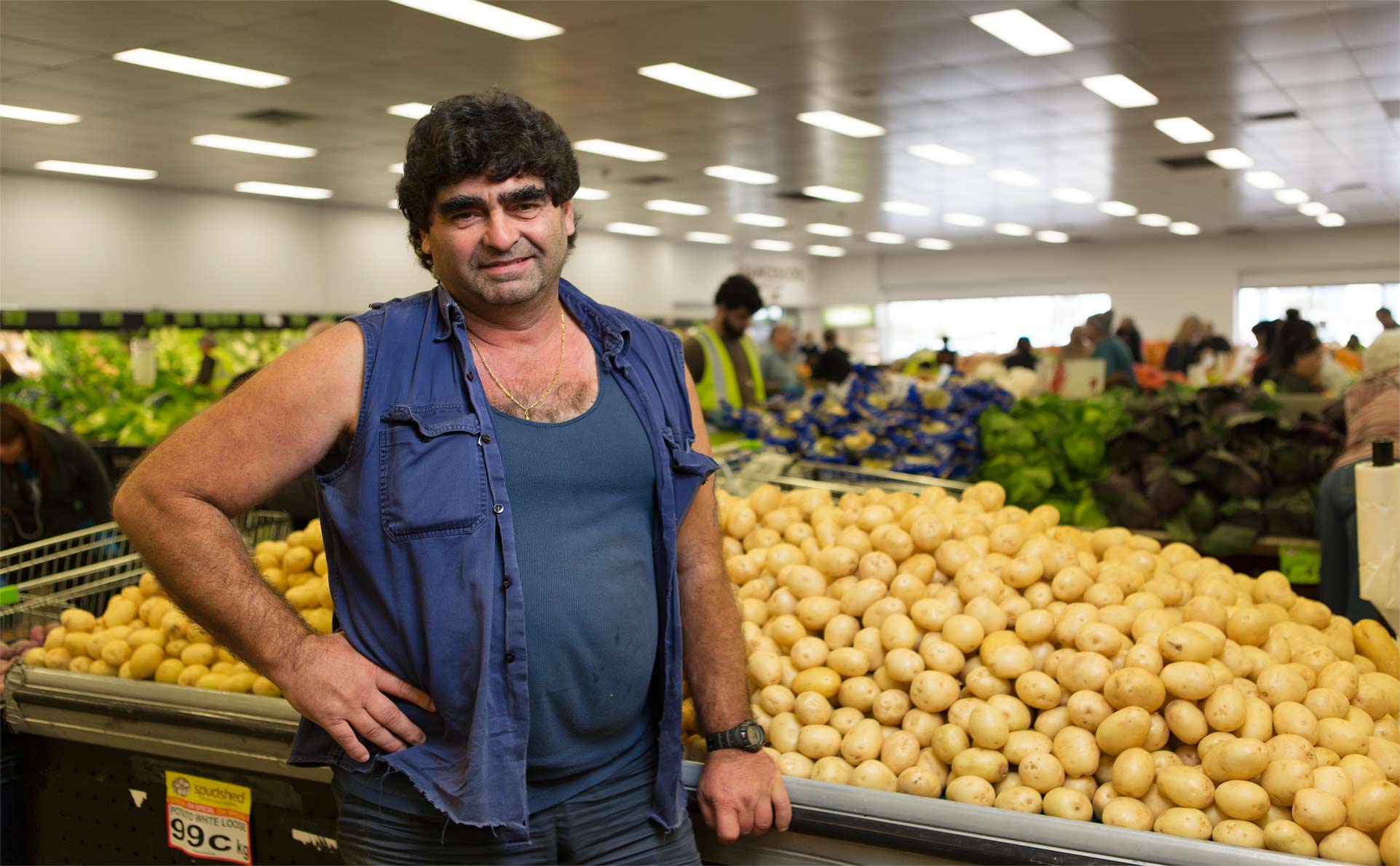 tony galati standing in a spud shed
